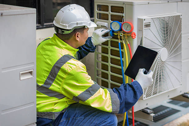 Professional Hvac Installation technician working in Alma, AR